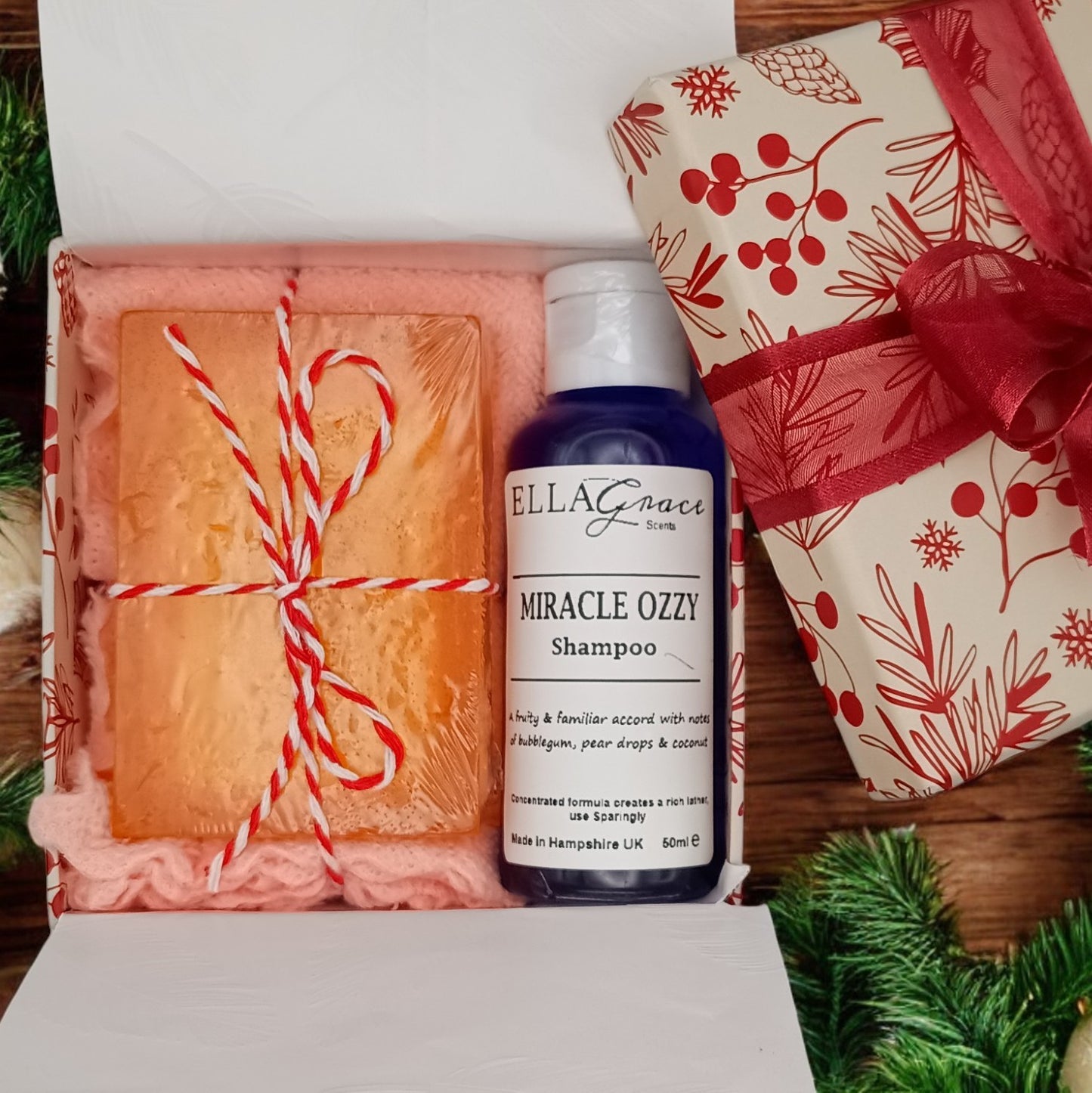 Christmas box, Wellness Serene soap bar, a soft pastel face cloth and Miracle Ozzy body wash