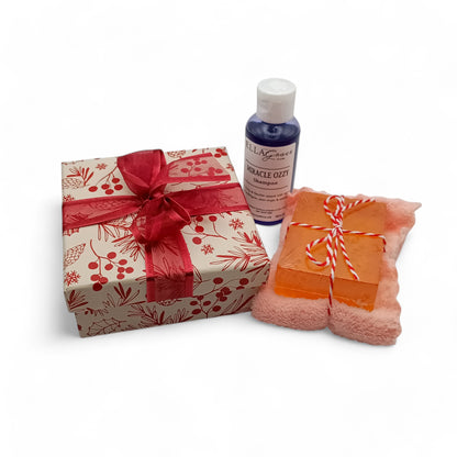 Christmas box, Wellness Serene soap bar, a soft pastel face cloth and Miracle Ozzy body wash