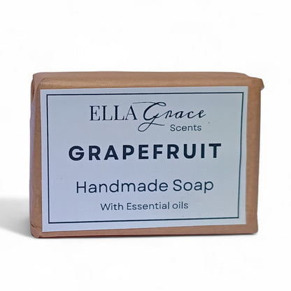Handmade soap bar by Ella Grace Scents with grapefruit scent on a white background
