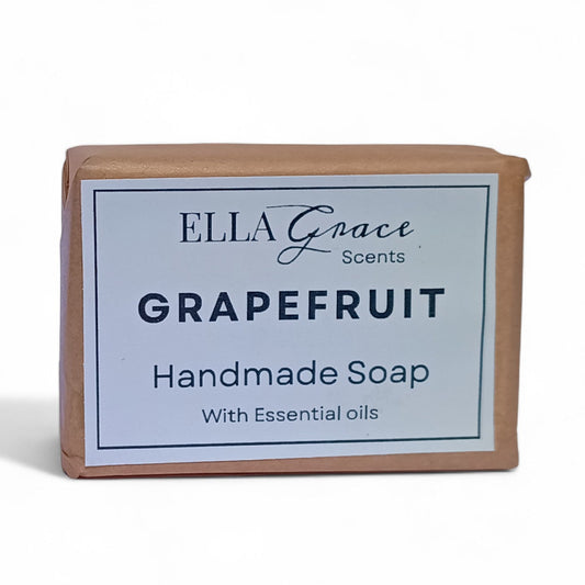 Handmade soap bar by Ella Grace Scents with grapefruit scent on a white background
